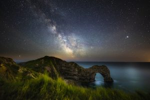 Durdle door against a starry sky