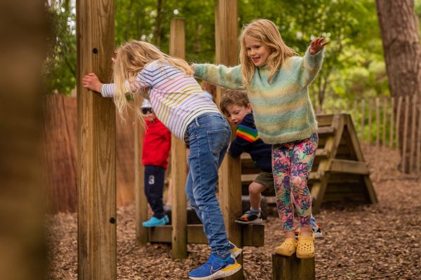 Children playing in the outdoor play area Burnbake